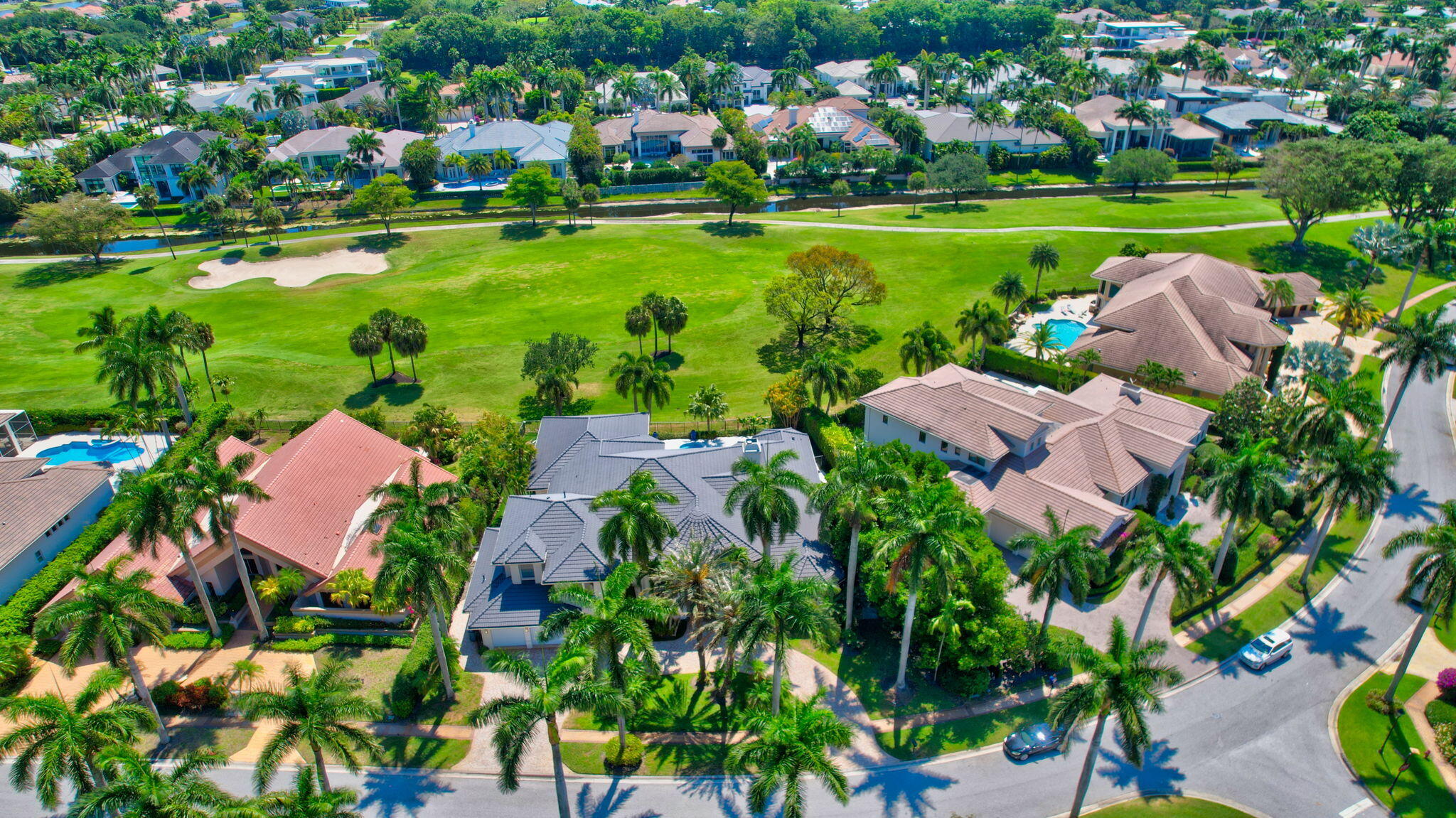 7090 Ayrshire Lane Boca Raton, FL 33496 - Photo 2 of 48 an aerial view of a houses with outdoor space and street view