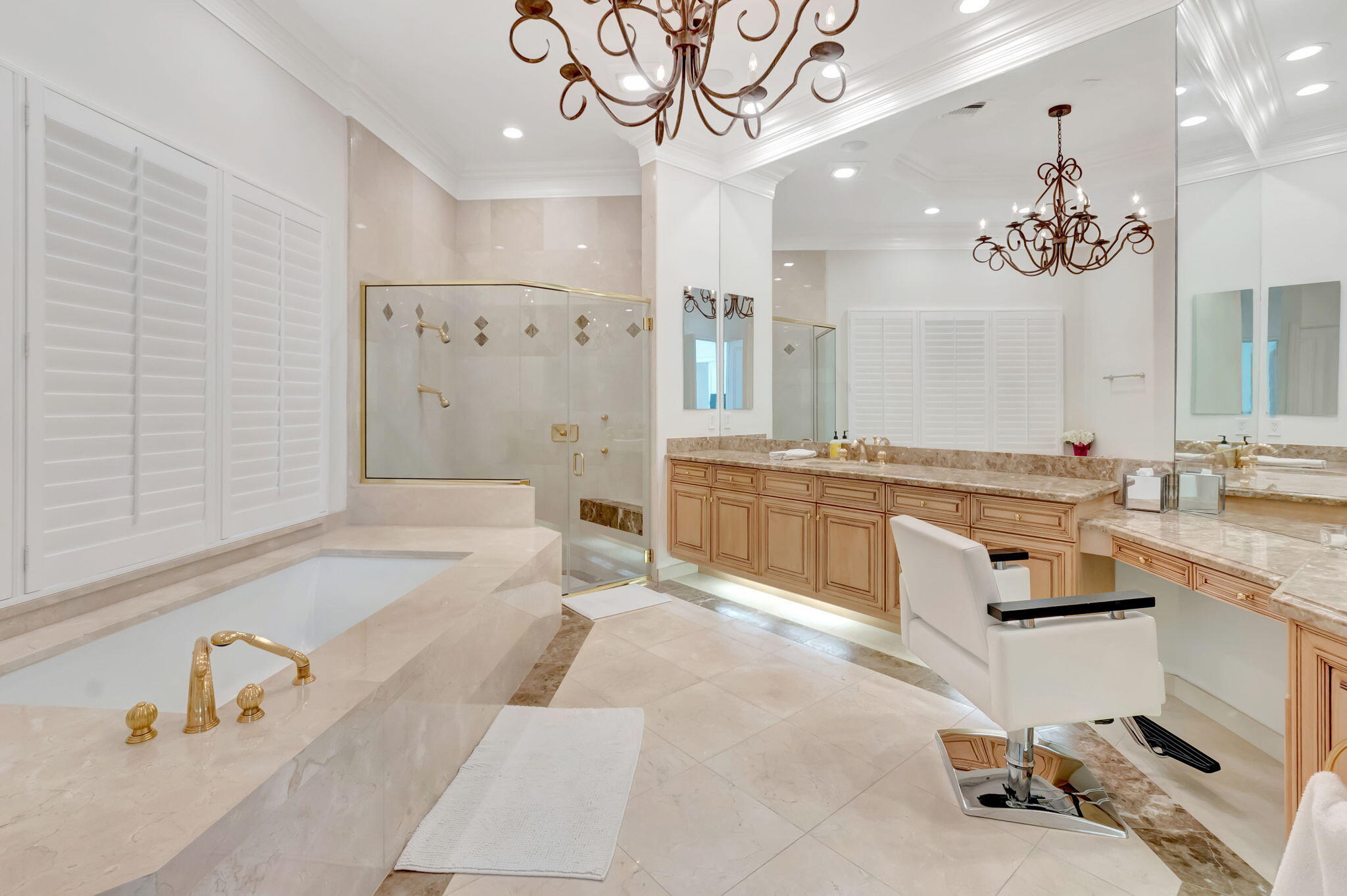 7090 Ayrshire Lane Boca Raton, FL 33496 - Photo 22 of 48 a spacious bathroom with a tub sink and mirror