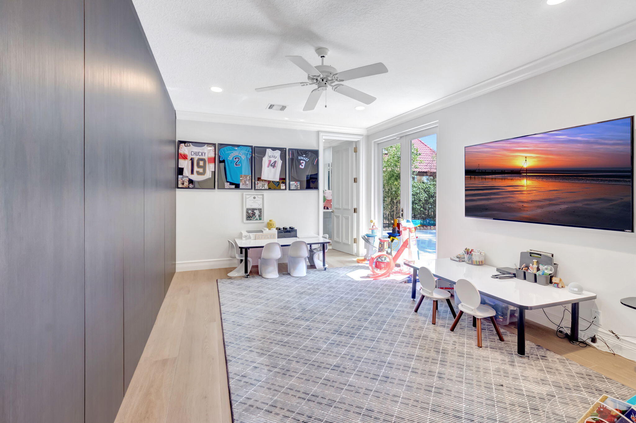 7090 Ayrshire Lane Boca Raton, FL 33496 - Photo 26 of 48 a living room with furniture and a flat screen tv