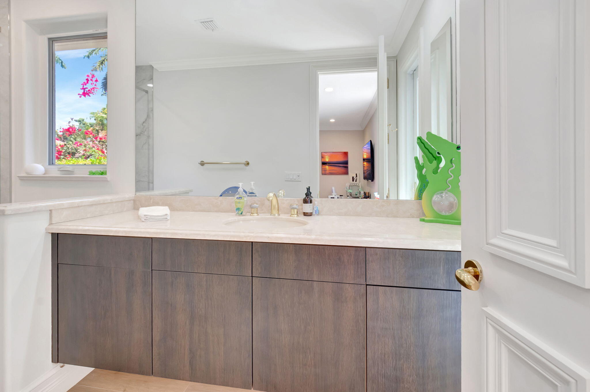 7090 Ayrshire Lane Boca Raton, FL 33496 - Photo 27 of 48 a bathroom with a sink and a mirror