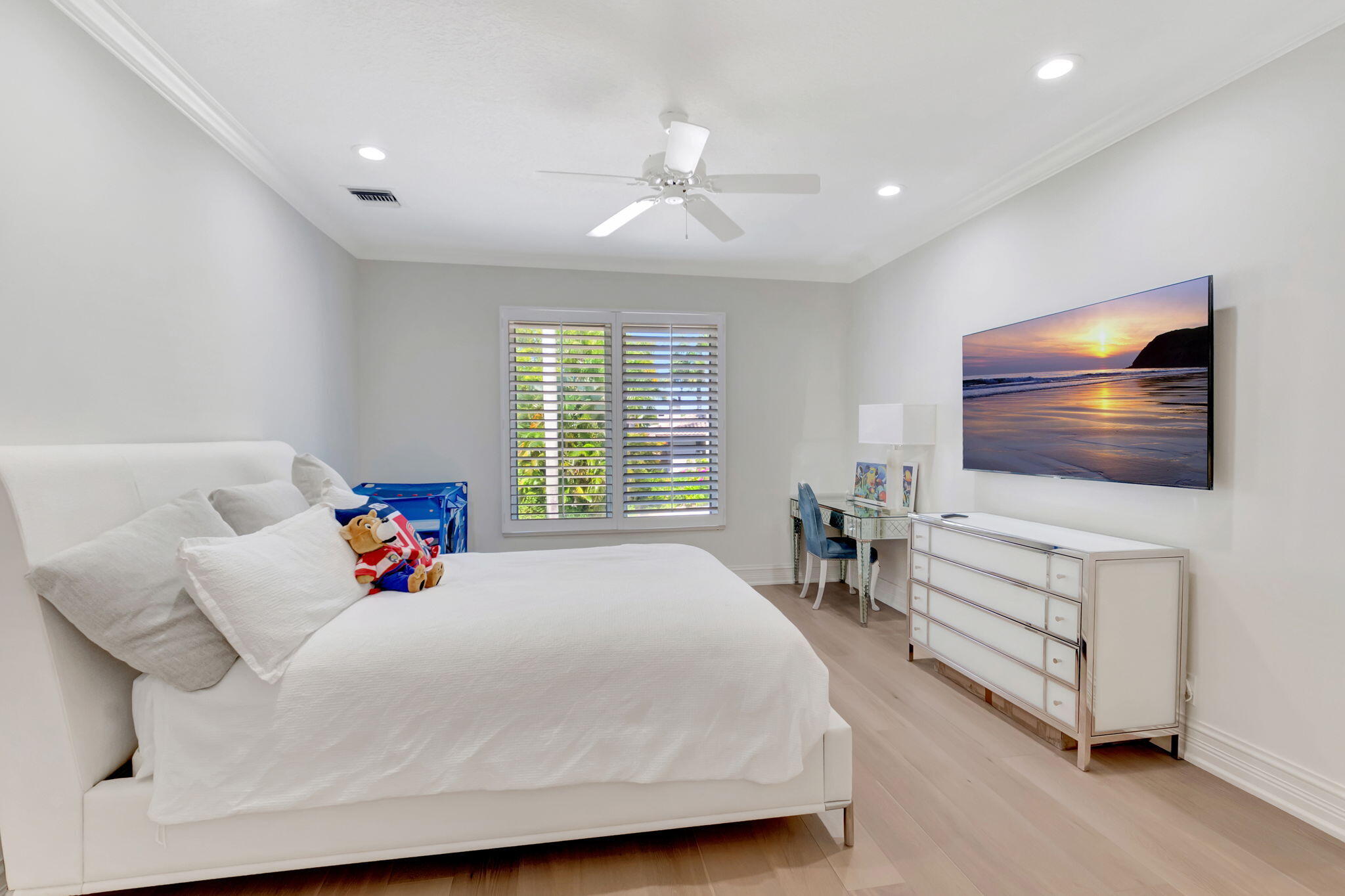 7090 Ayrshire Lane Boca Raton, FL 33496 - Photo 28 of 48 a bedroom with a bed and a flat screen tv