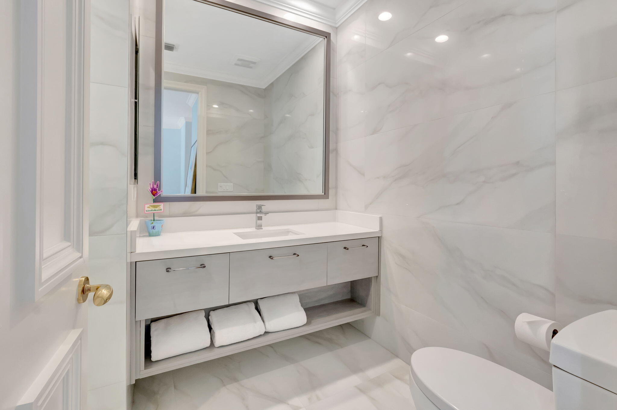 7090 Ayrshire Lane Boca Raton, FL 33496 - Photo 29 of 48 a bathroom with a sink toilet and shower