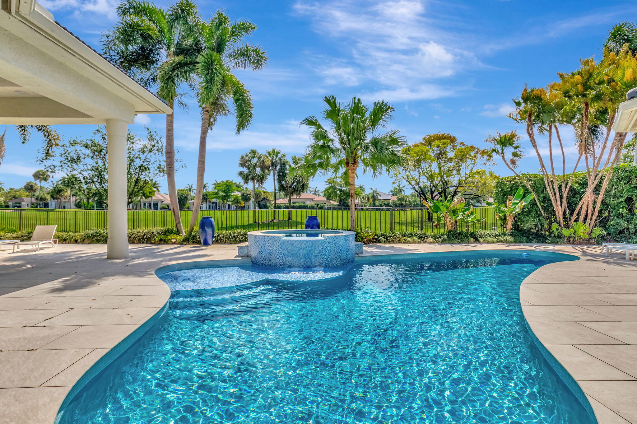 7090 Ayrshire Lane Boca Raton, FL 33496 - Photo 32 of 48 a view of a garden with a slide