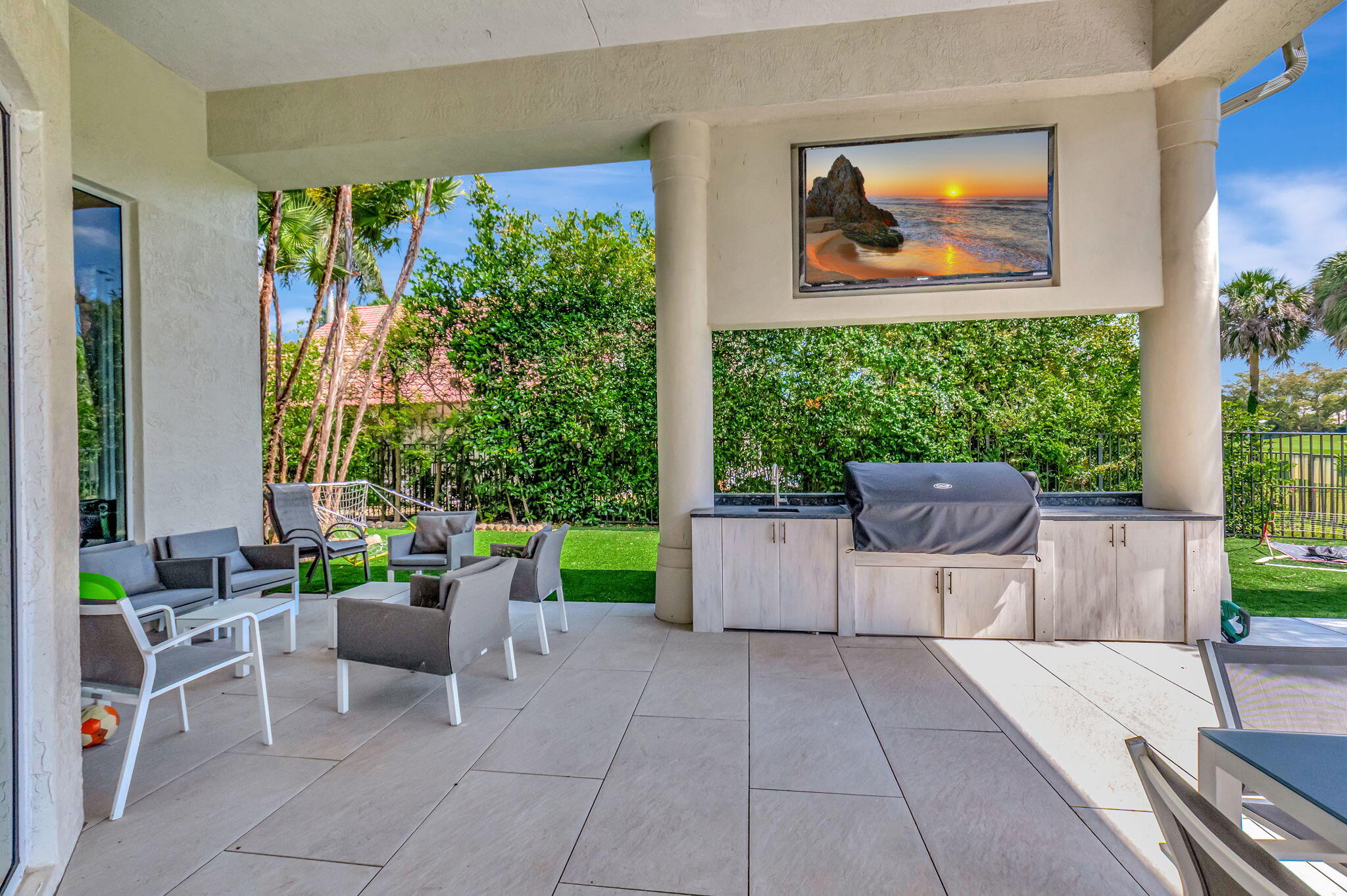 7090 Ayrshire Lane Boca Raton, FL 33496 - Photo 36 of 48 a view of an outdoor dining space with a patio