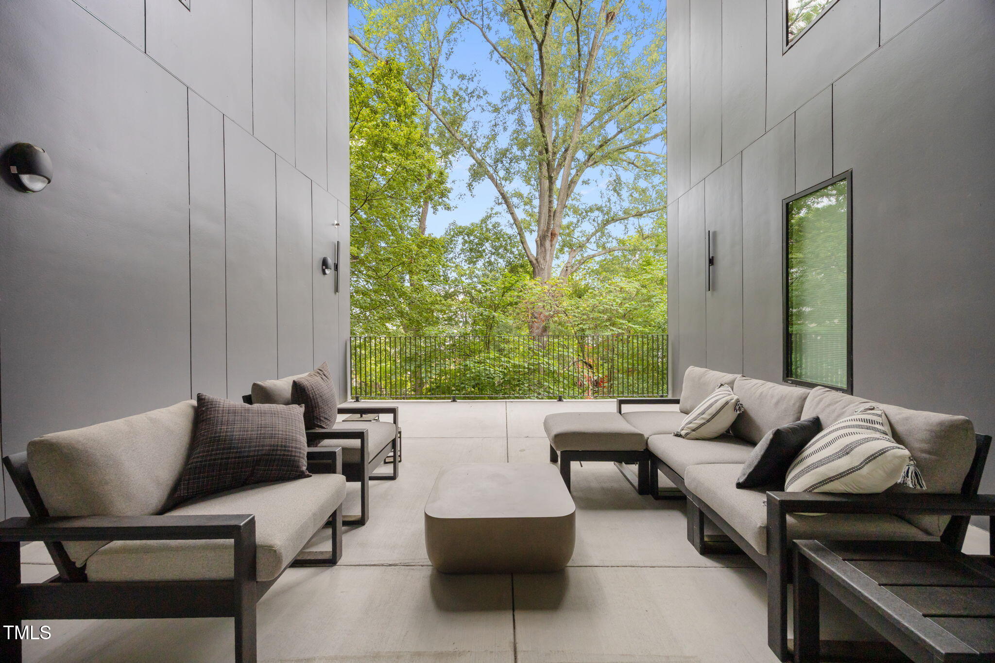29 Enterprise Street, Unit 309 Raleigh, NC 27607 - Photo 28 of 34 a living room with furniture and a potted plant
