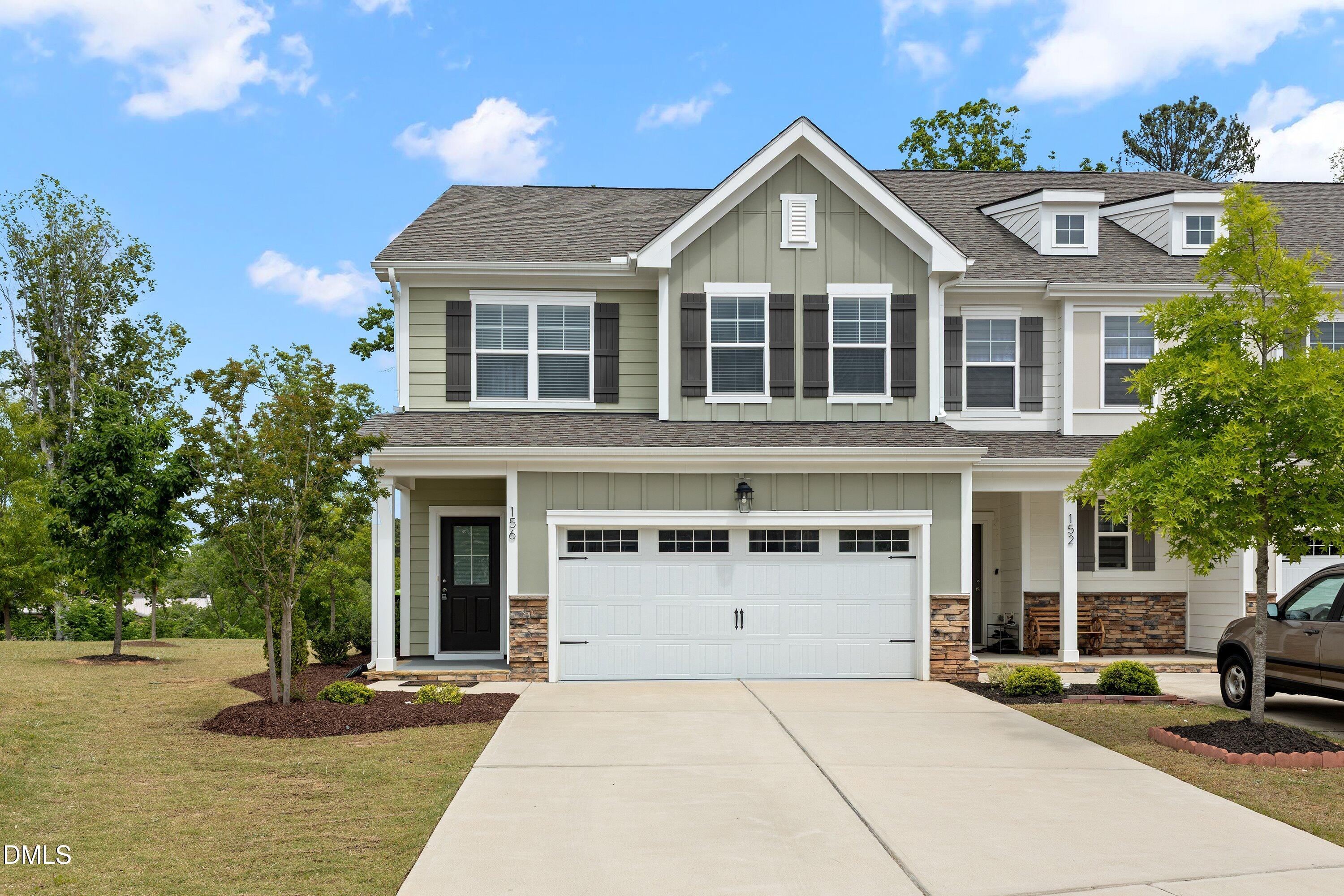 156 Sears Ridge Lane Morrisville, NC 27560 - Photo 1 of 49 a front view of a house with a yard