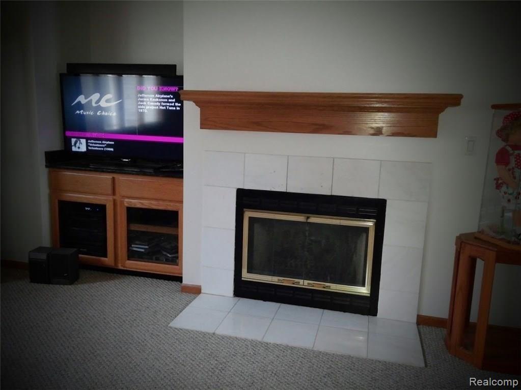 6878 Kestrel Ridge Road Brighton, MI 48116 - Photo 13 of 28 Living Room 3 w/Fireplace