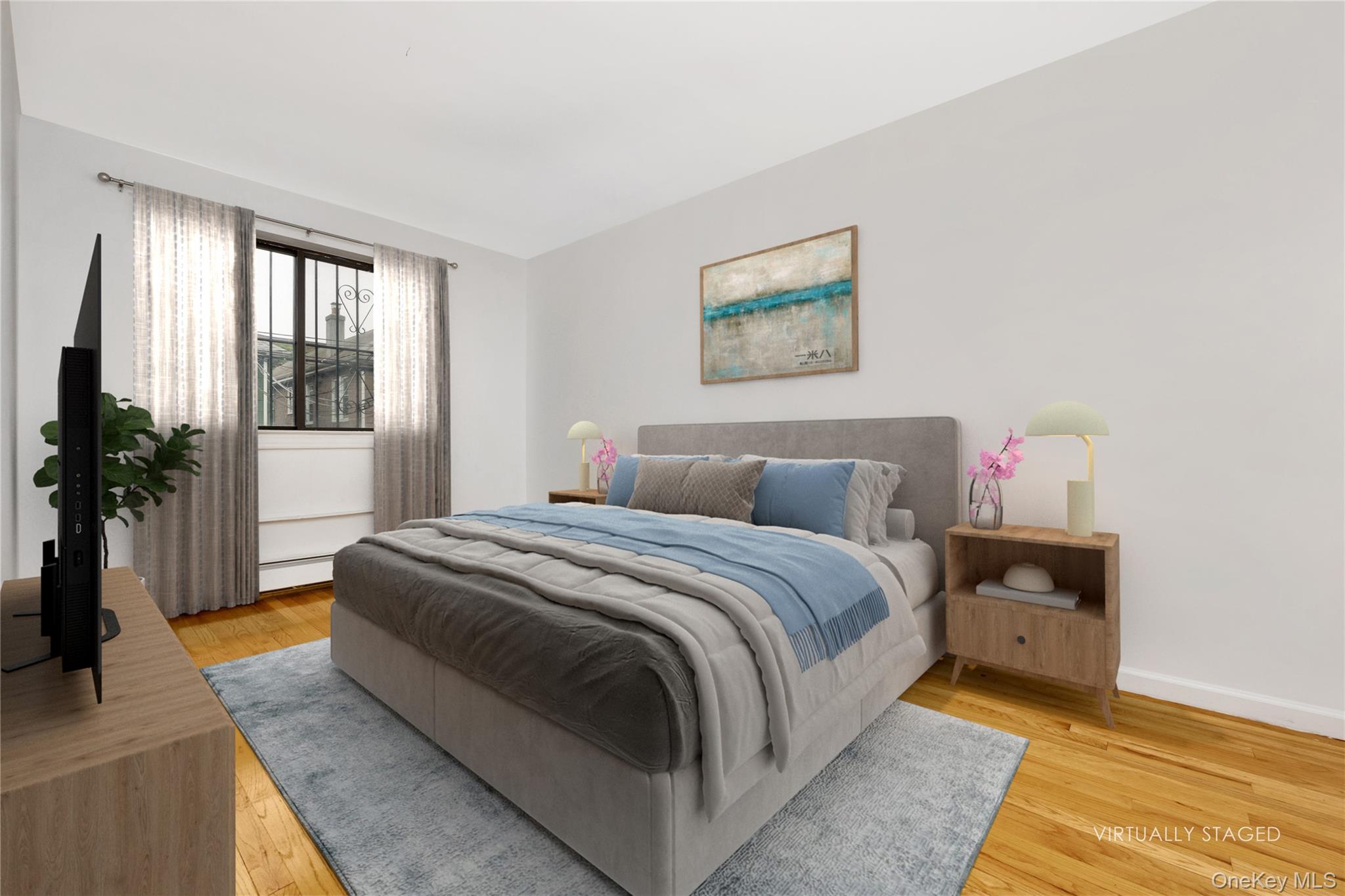 41-23 76th Street, Unit 2B Queens, NY 11373 - Photo 3 of 8 Nice size bedroom featuring hardwood floors and two closets/air conditioning unit included