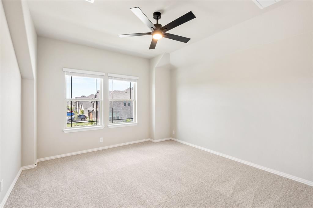 2016 Dundalk Lane Forney, TX 75126 - Photo 30 of 40 an empty room with a window and a fan