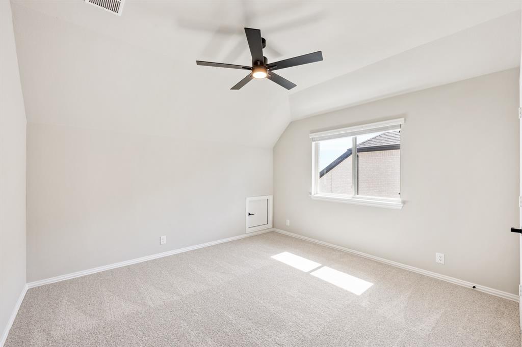 2016 Dundalk Lane Forney, TX 75126 - Photo 36 of 40 an empty room with windows and fan