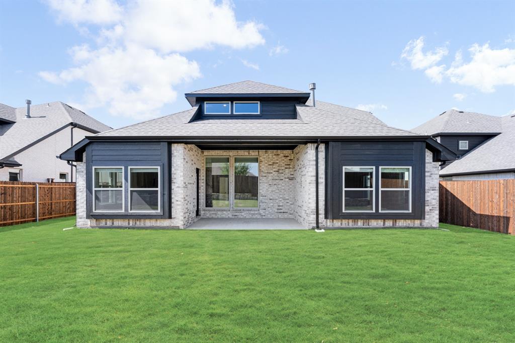 2016 Dundalk Lane Forney, TX 75126 - Photo 38 of 40 a front view of a house with a yard and porch