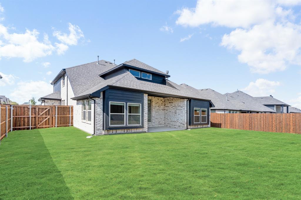 2016 Dundalk Lane Forney, TX 75126 - Photo 39 of 40 a view of a house with a yard and sitting area