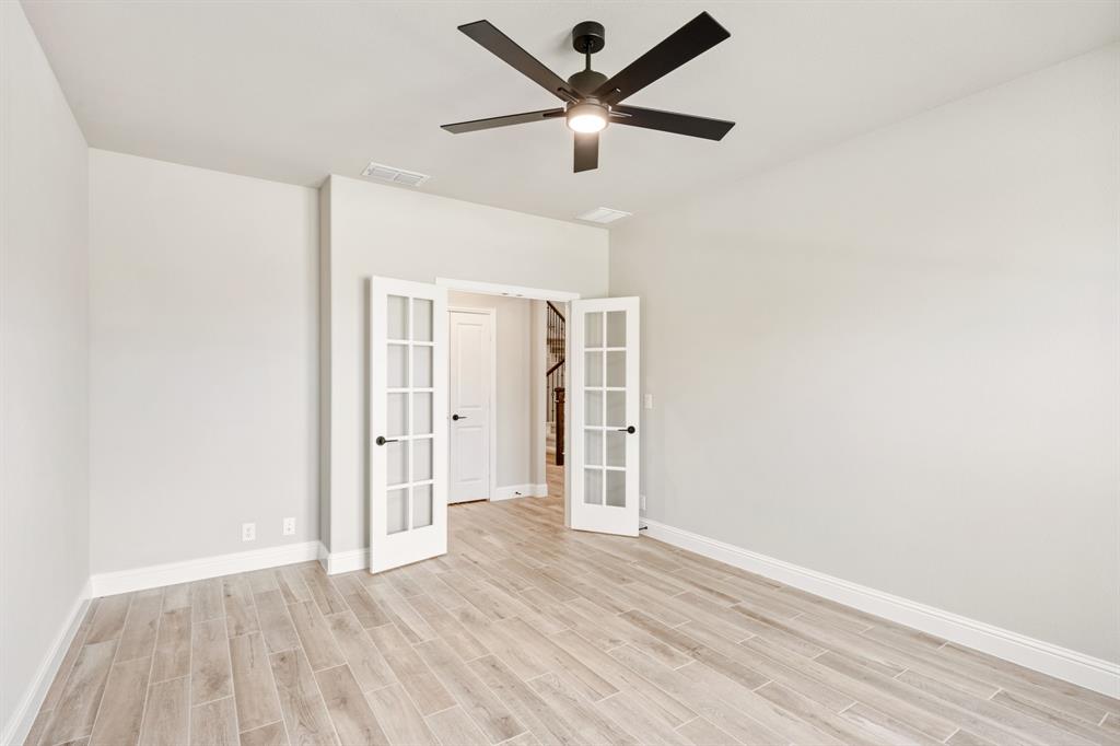 2016 Dundalk Lane Forney, TX 75126 - Photo 7 of 40 a view of empty room with wooden floor