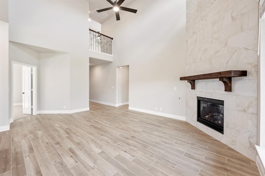 2016 Dundalk Lane Forney, TX 75126 - Photo 8 of 40 a view of an empty room with a fireplace