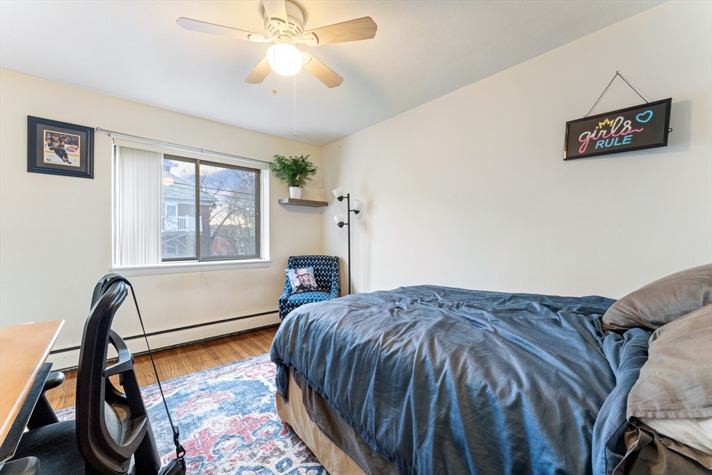 425 South Huntington Avenue, Unit 6 Boston, MA 02130 - Photo 13 of 19 a bed sitting in a bedroom next to a window