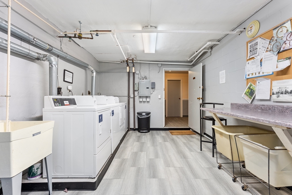 425 South Huntington Avenue, Unit 6 Boston, MA 02130 - Photo 15 of 19 a utility room with cabinets