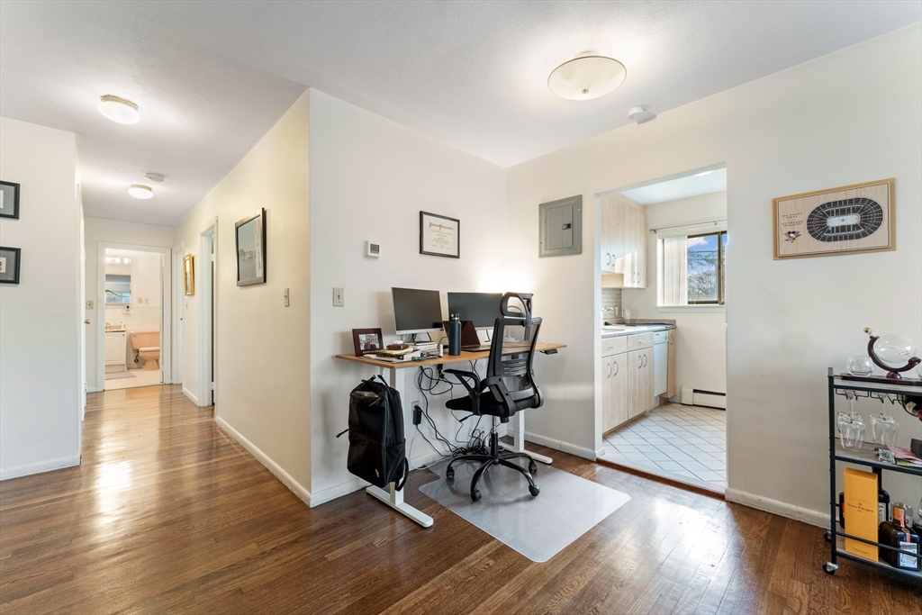 425 South Huntington Avenue, Unit 6 Boston, MA 02130 - Photo 6 of 19 a view of a workspace with wooden floor