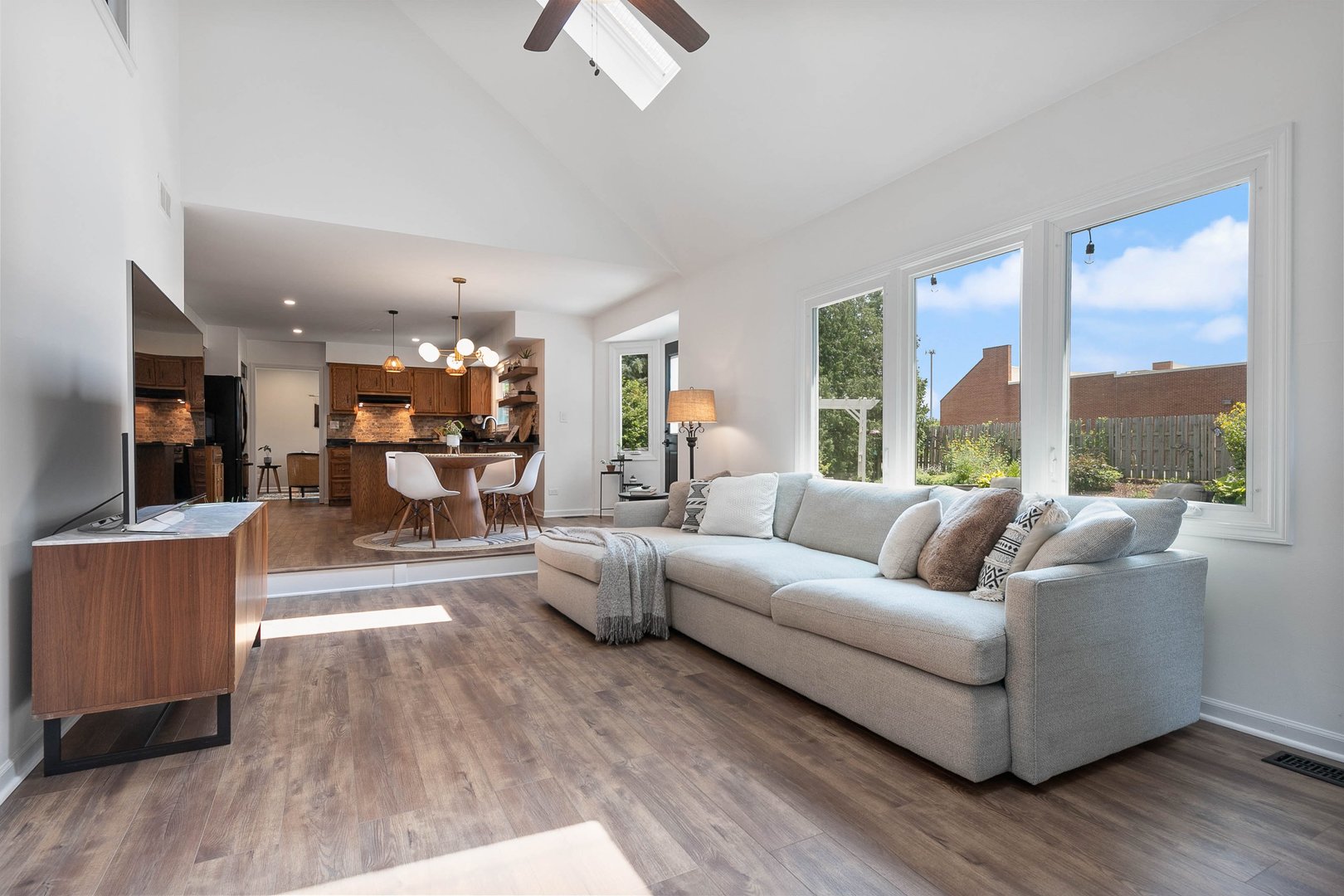 16 Redstart Road Naperville, IL 60565 - Photo 12 of 23 a living room with furniture and a large window