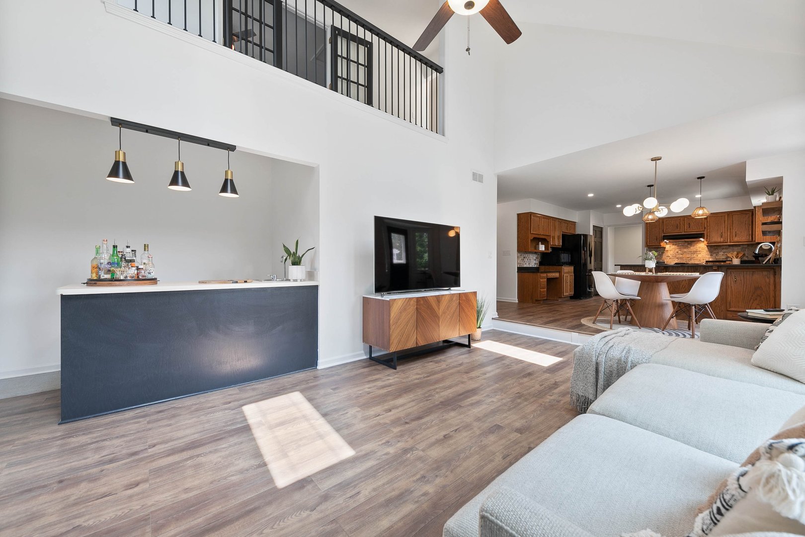 16 Redstart Road Naperville, IL 60565 - Photo 14 of 23 a living room with furniture and a flat screen tv