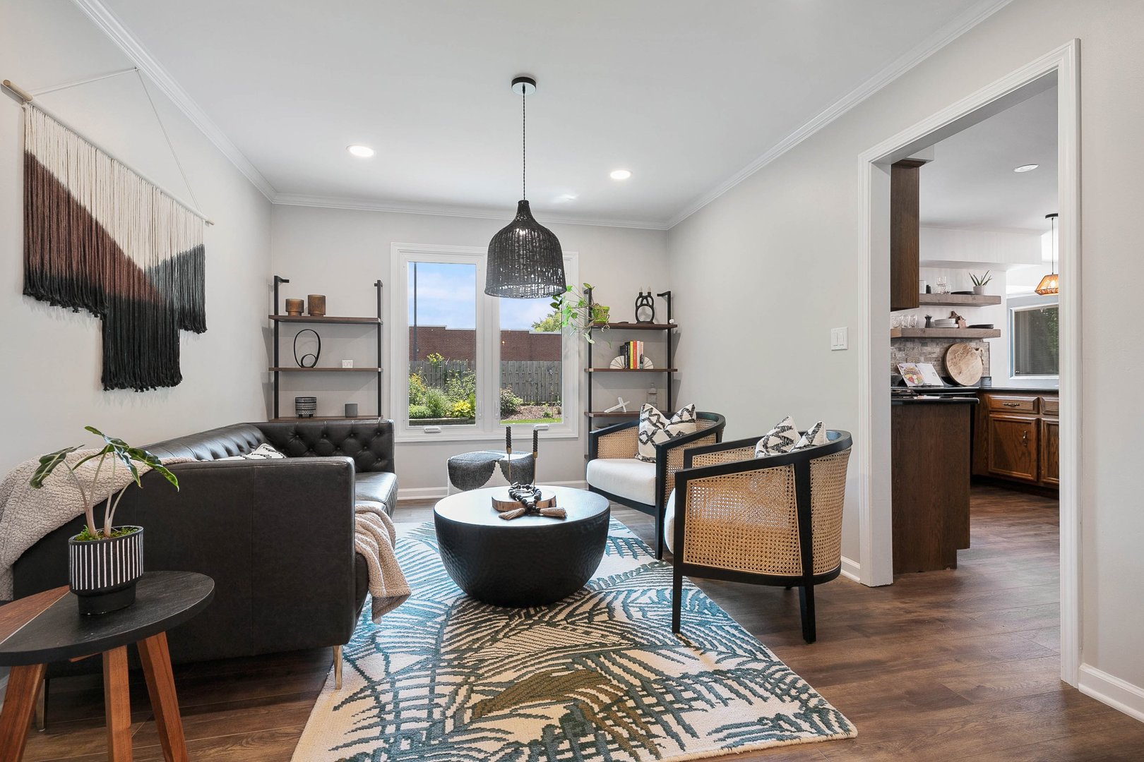 16 Redstart Road Naperville, IL 60565 - Photo 6 of 23 a living room with furniture a rug and a chandelier