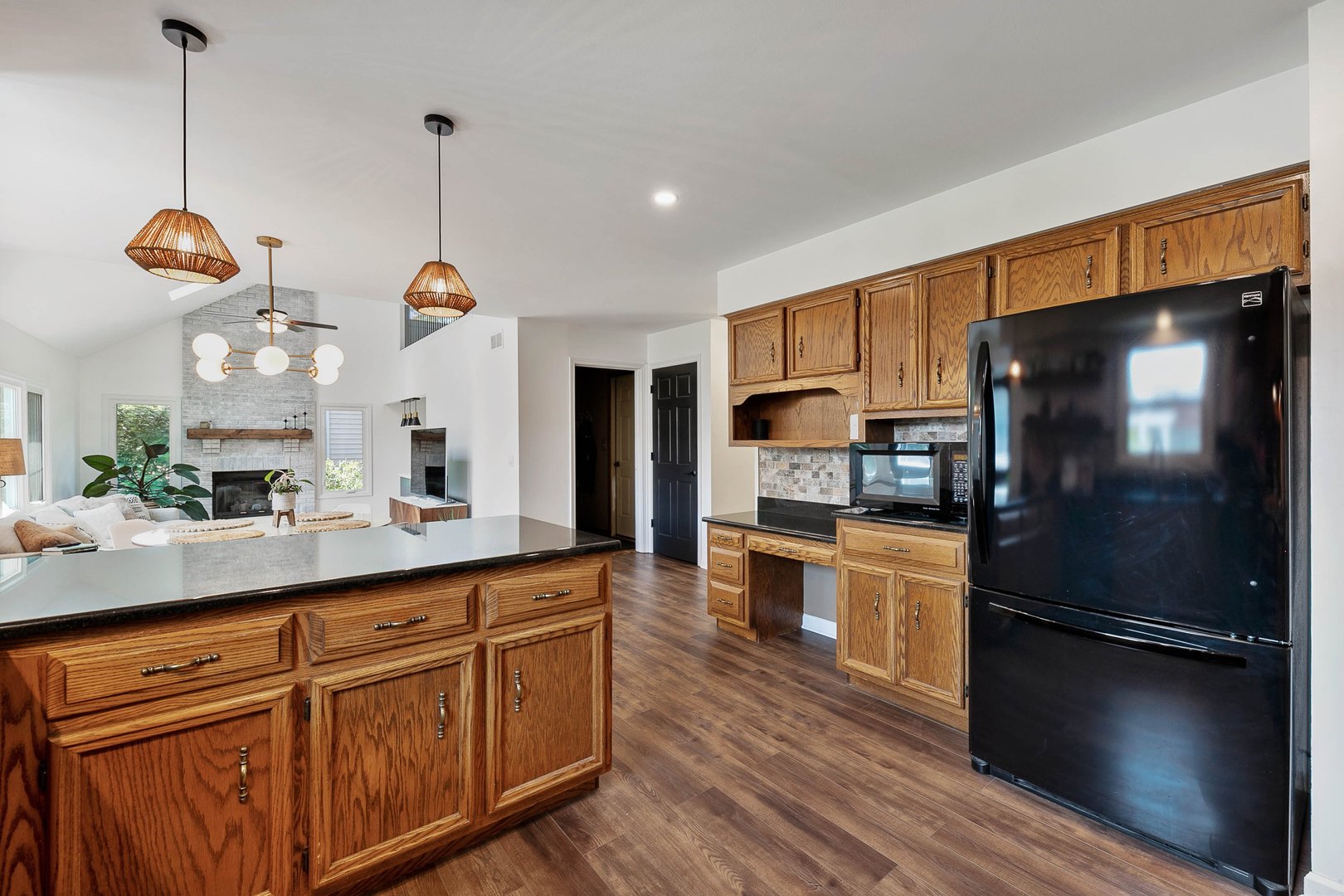 16 Redstart Road Naperville, IL 60565 - Photo 9 of 23 a kitchen with granite countertop stainless steel appliances and wooden floor