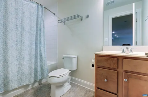a view of balcony with wooden floor