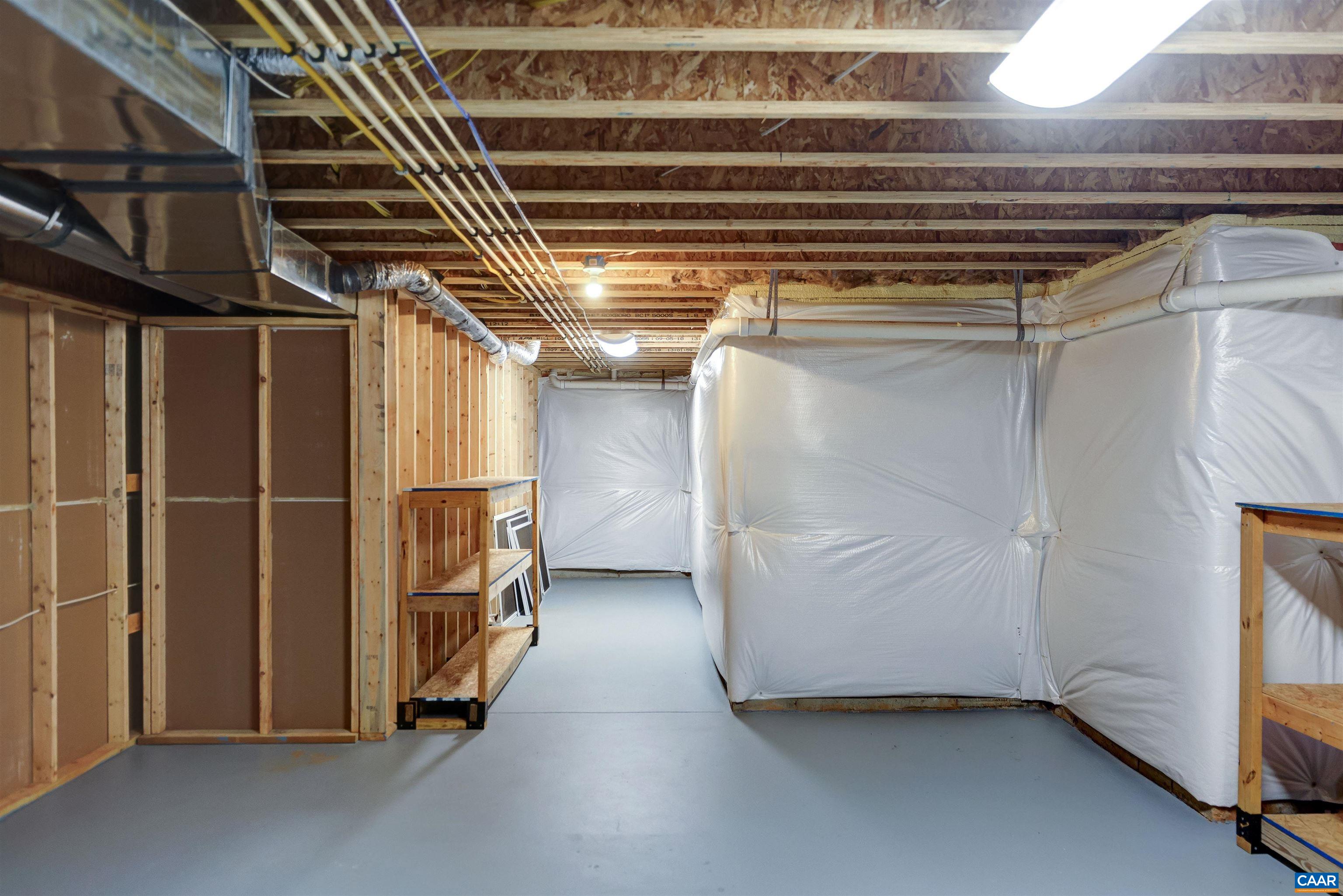 289 Appalachian Lane Zion Crossroads, VA 22942 - Photo 29 of 50 a view of an empty room with wooden shelves