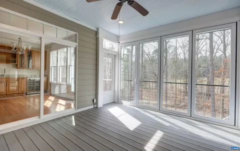 a kitchen with a stove and a refrigerator
