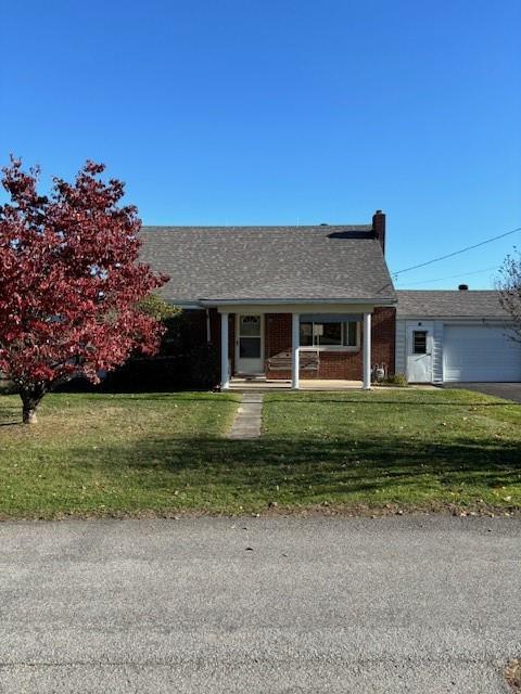 32 Elich Road Burgettstown, PA 15021 - Photo 3 of 48 a front view of a house with a garden