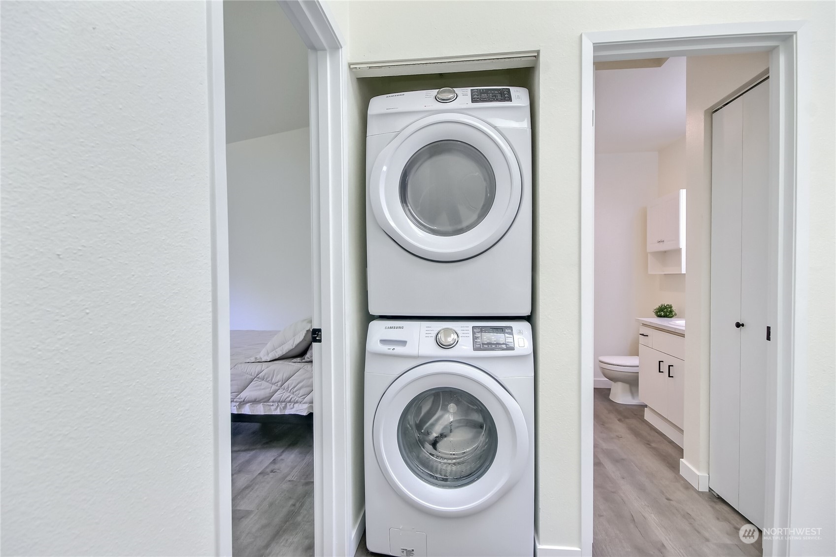 1825 South 330th Street, Unit E3 Federal Way, WA 98003 - Photo 17 of 26 a view of a hallway with washer and dryer