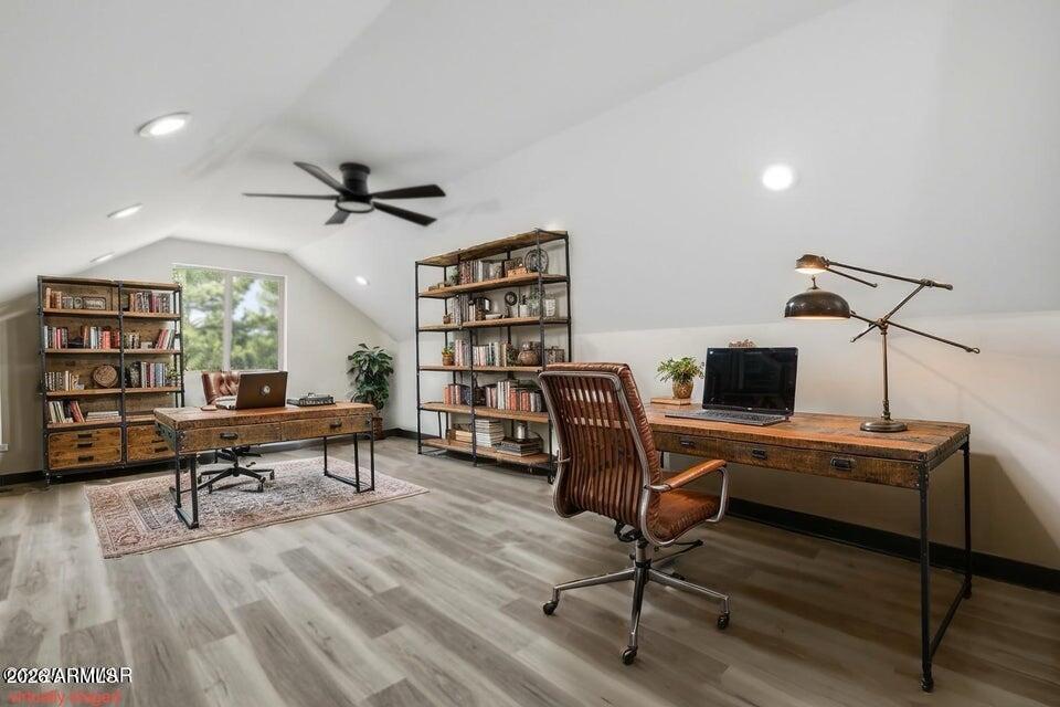 2381 West Bench Road Show Low, AZ 85901 - Photo 30 of 45 a view of a workspace with furniture and a ceiling fan