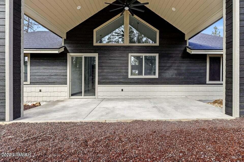 2381 West Bench Road Show Low, AZ 85901 - Photo 33 of 45 a view of a brick house with windows