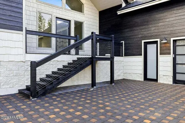 a bench sitting in front of a building