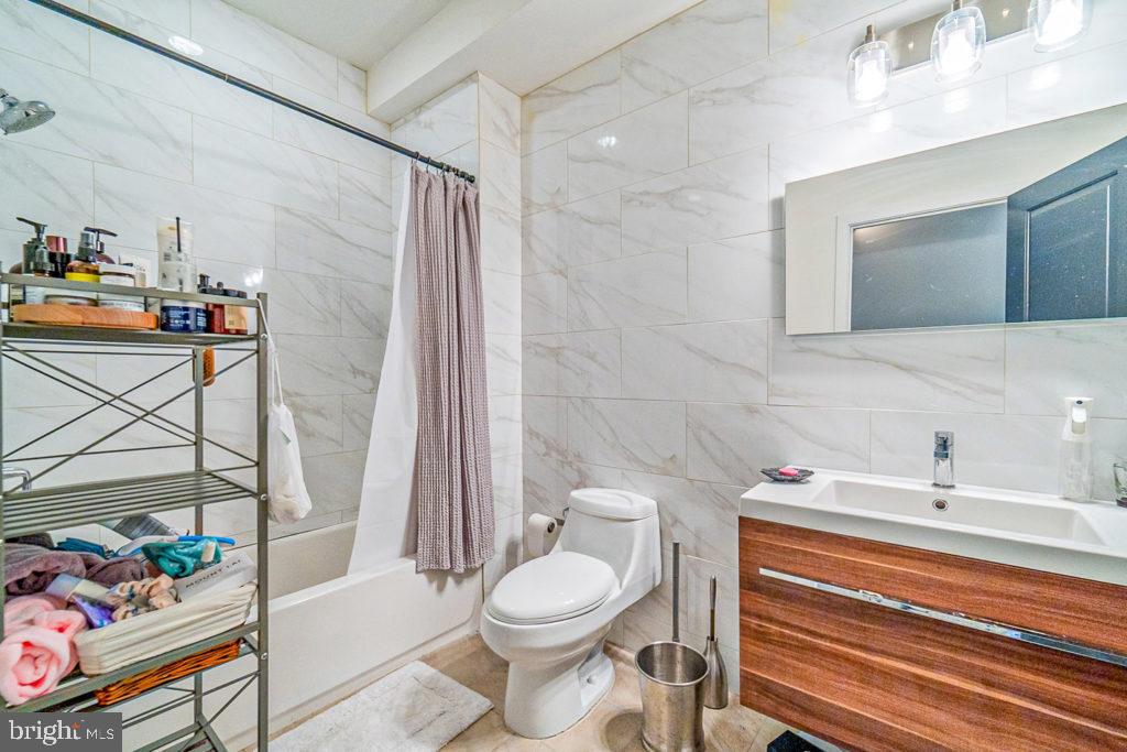 19 North 3rd Street Philadelphia, PA 19106 - Photo 11 of 14 a bathroom with a sink toilet and shower