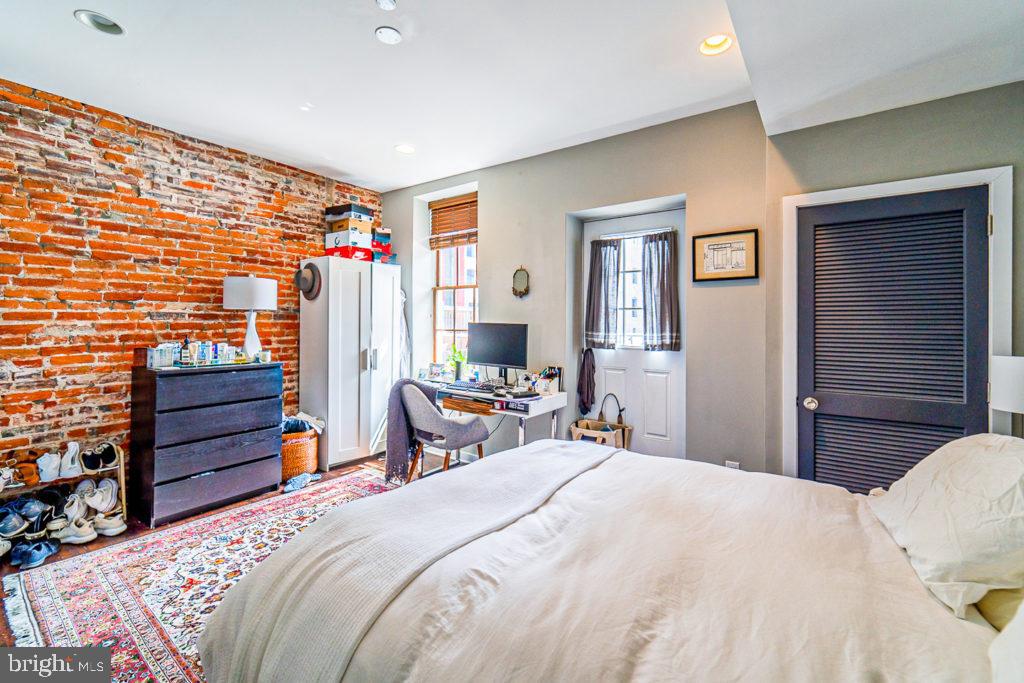 19 North 3rd Street Philadelphia, PA 19106 - Photo 10 of 14 a bedroom with a bed and a closet