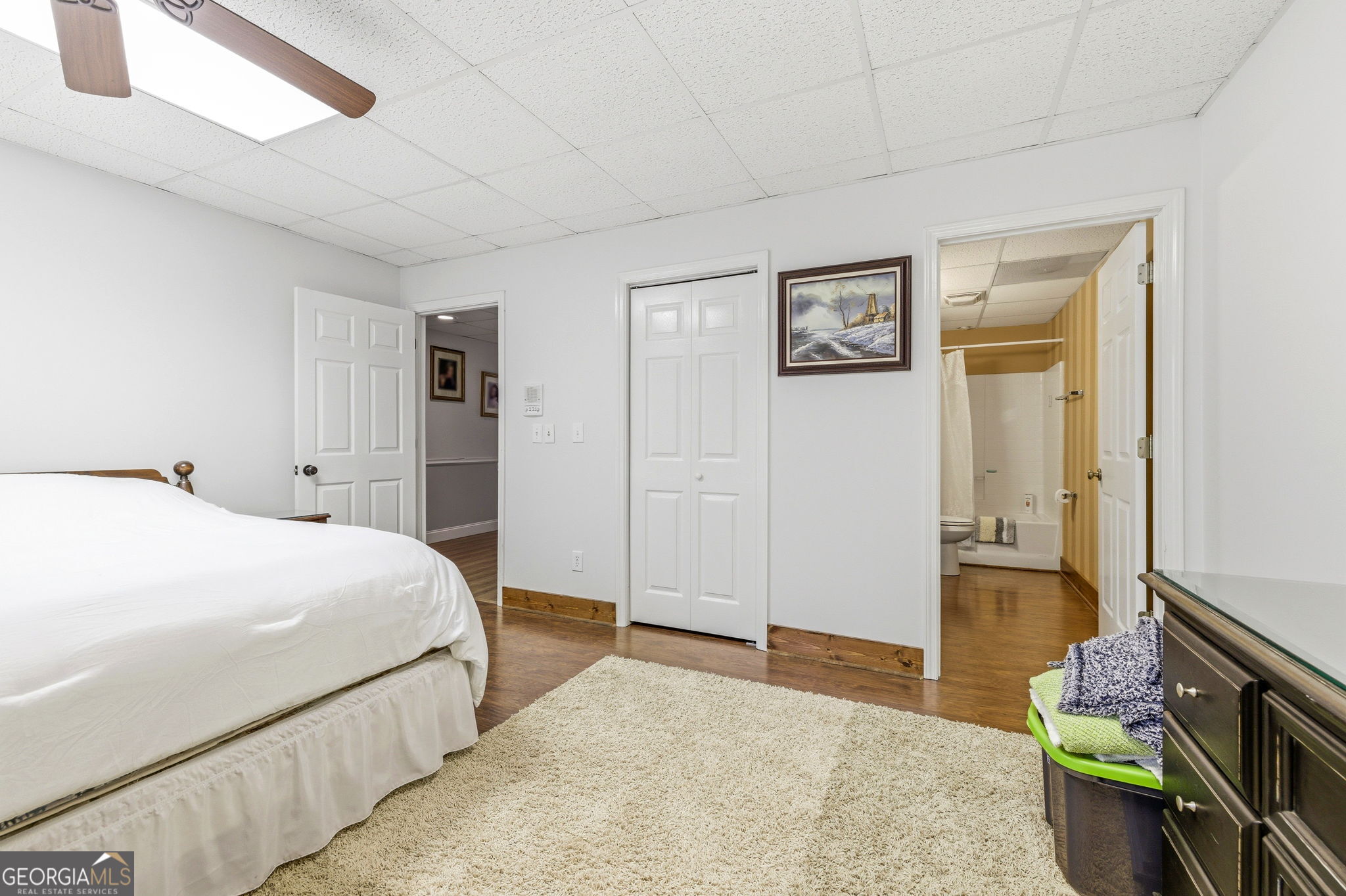 401 Herrin Road Cornelia, GA 30531 - Photo 28 of 83 a bedroom with a bed and a flat screen tv