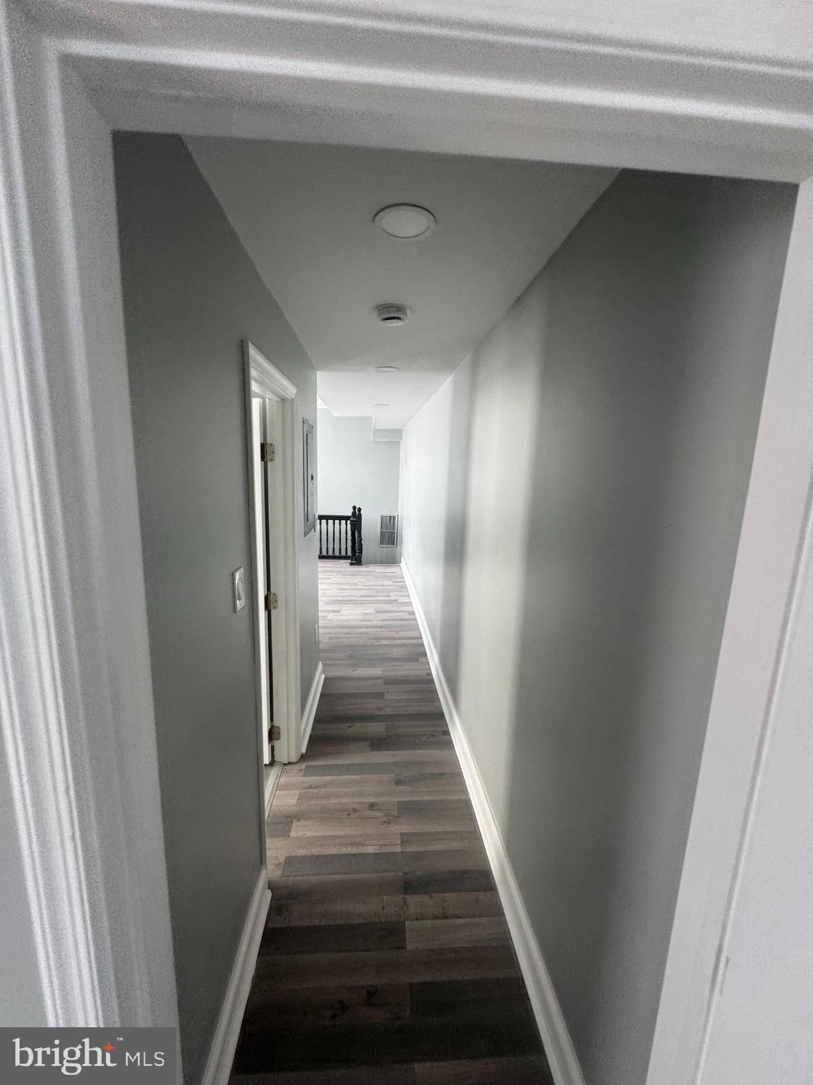 4303 York Road Baltimore, MD 21212 - Photo 9 of 21 a view of a hallway with wooden floor and staircase