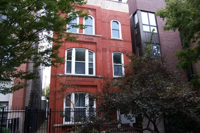 a front view of a multi story residential apartment building