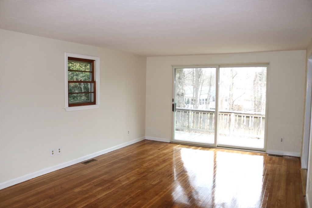 28 Chevy Chase Road Worcester, MA 01606 - Photo 5 of 17 a view of an empty room with wooden floor and a window