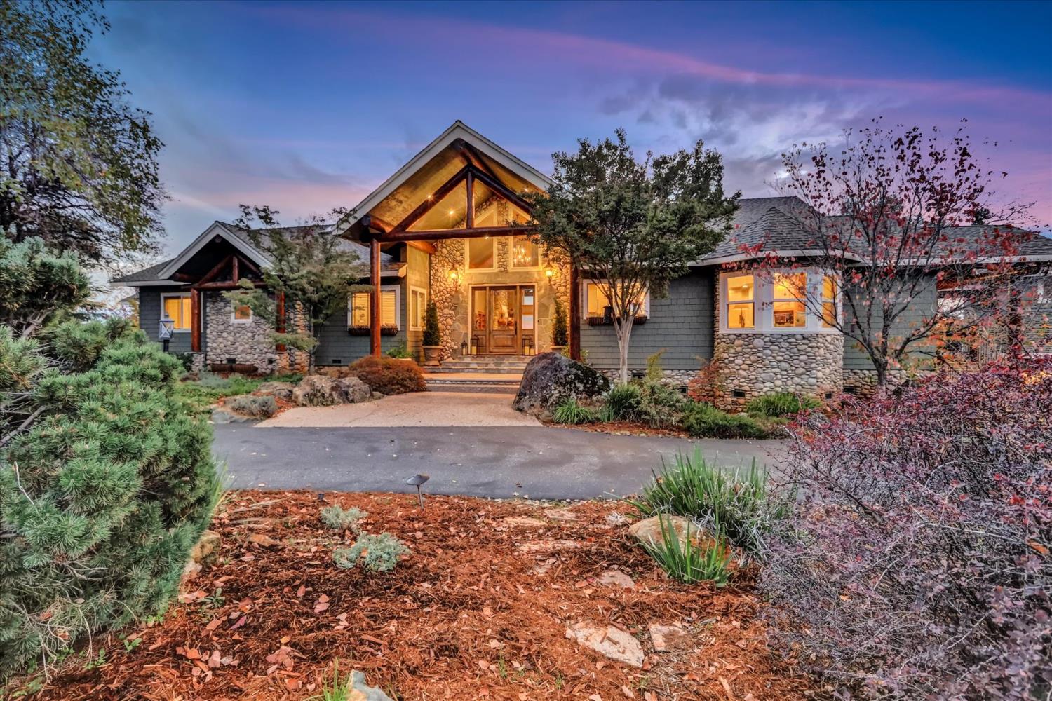 23986 Clayton Road Grass Valley, CA 95949 - Photo 1 of 1 a front view of a house with yard and green space