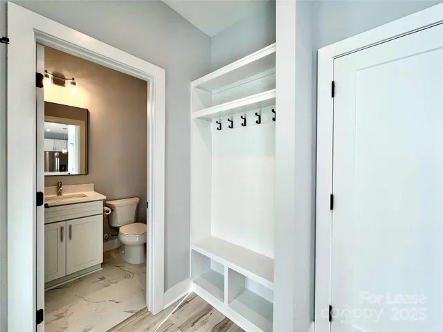 a view of a bathroom from the hallway
