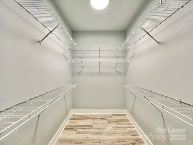 a view of a room with racks on the wall