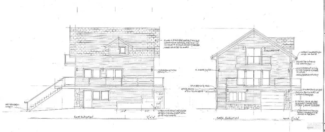 a black and white photo of a living room