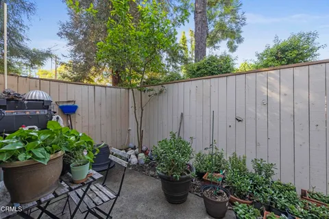 a garden view with a seating space