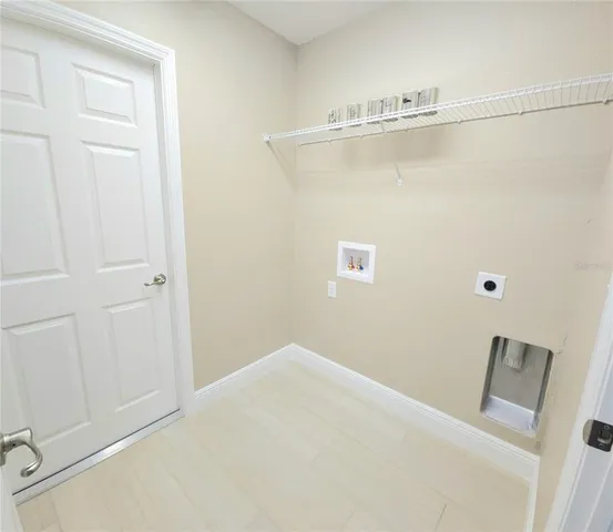 a view of a room with racks on the wall