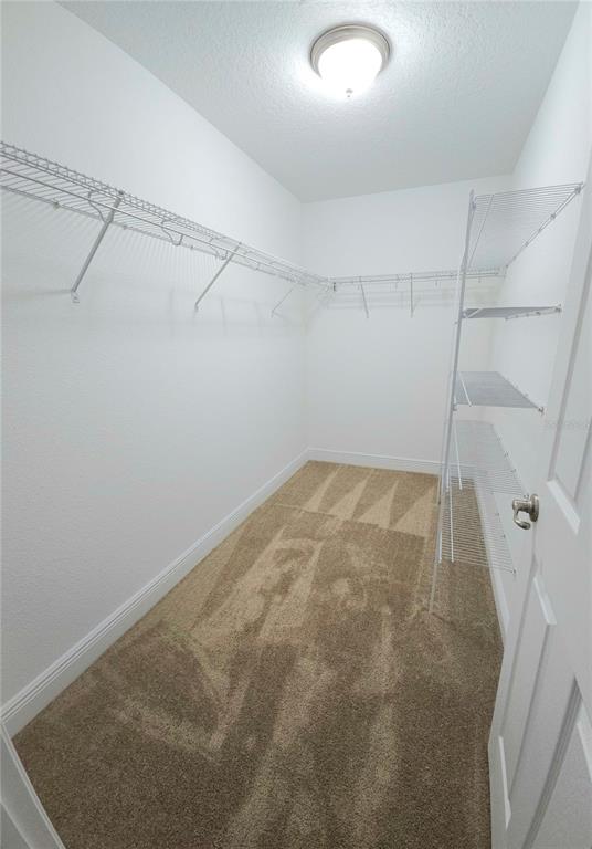 7794 North Keystone Drive Citrus Springs, FL 34433 - Photo 7 of 14 a view of a room with racks on the wall