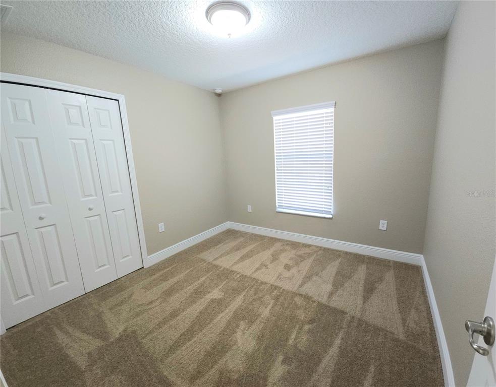 7794 North Keystone Drive Citrus Springs, FL 34433 - Photo 9 of 14 a view of an empty room and window