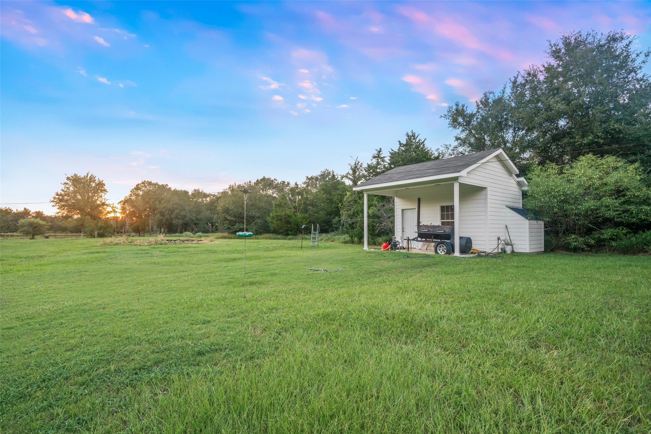 27201 Double Culvert Road Hempstead, TX 77445 - Photo 48 of 48 a view of a house with backyard and garden