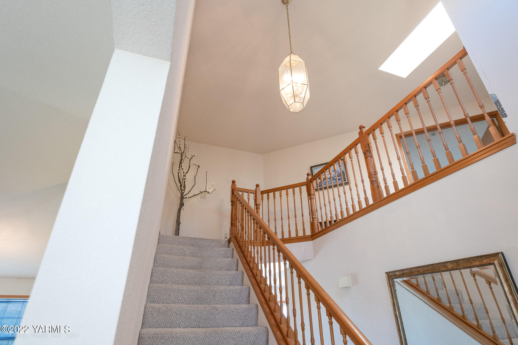 3870 Aaron Road Moxee, WA 98936 - Photo 13 of 33 a view of staircase with railing and white walls