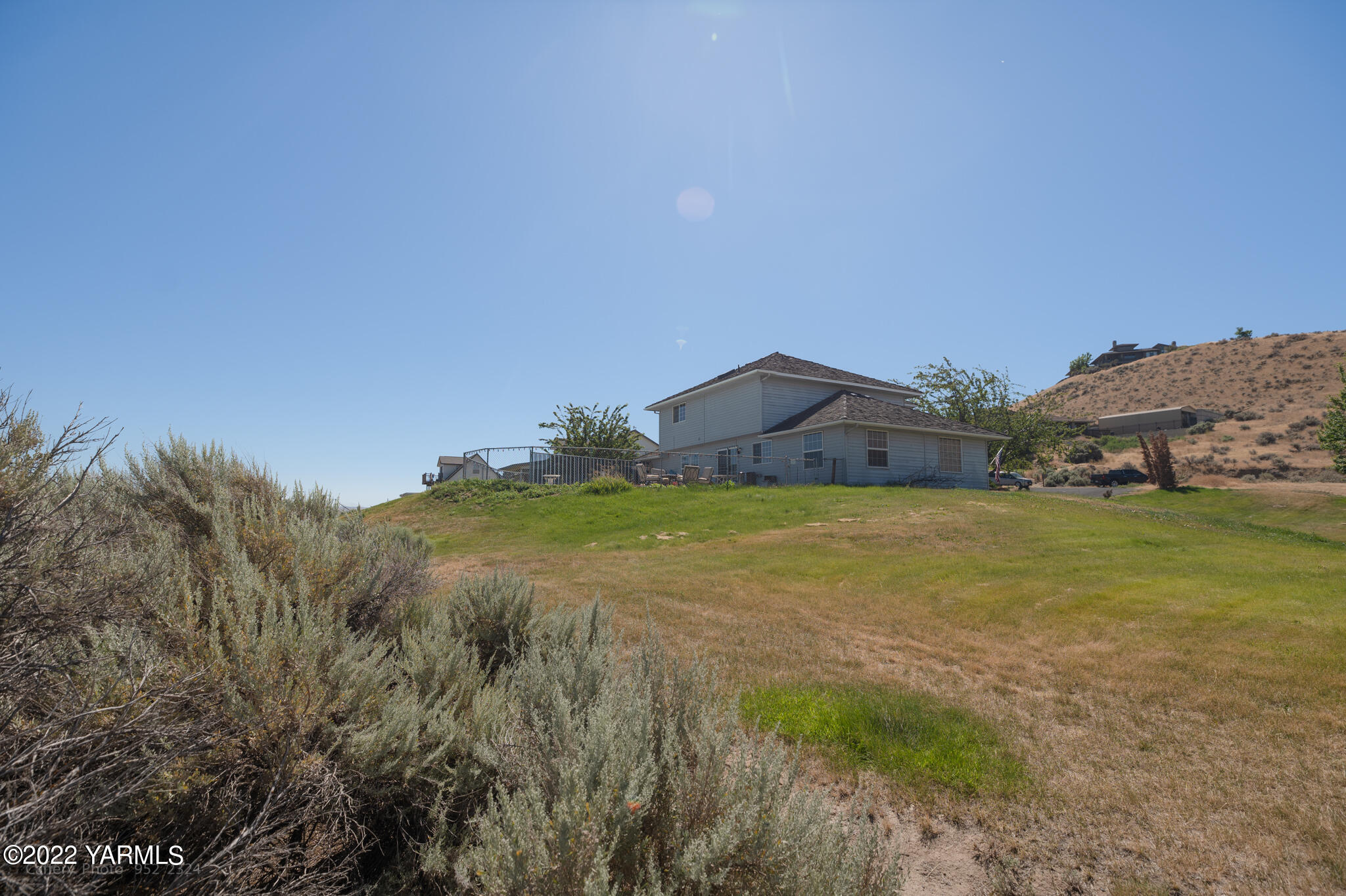 3870 Aaron Road Moxee, WA 98936 - Photo 29 of 33 a car parked in front of house
